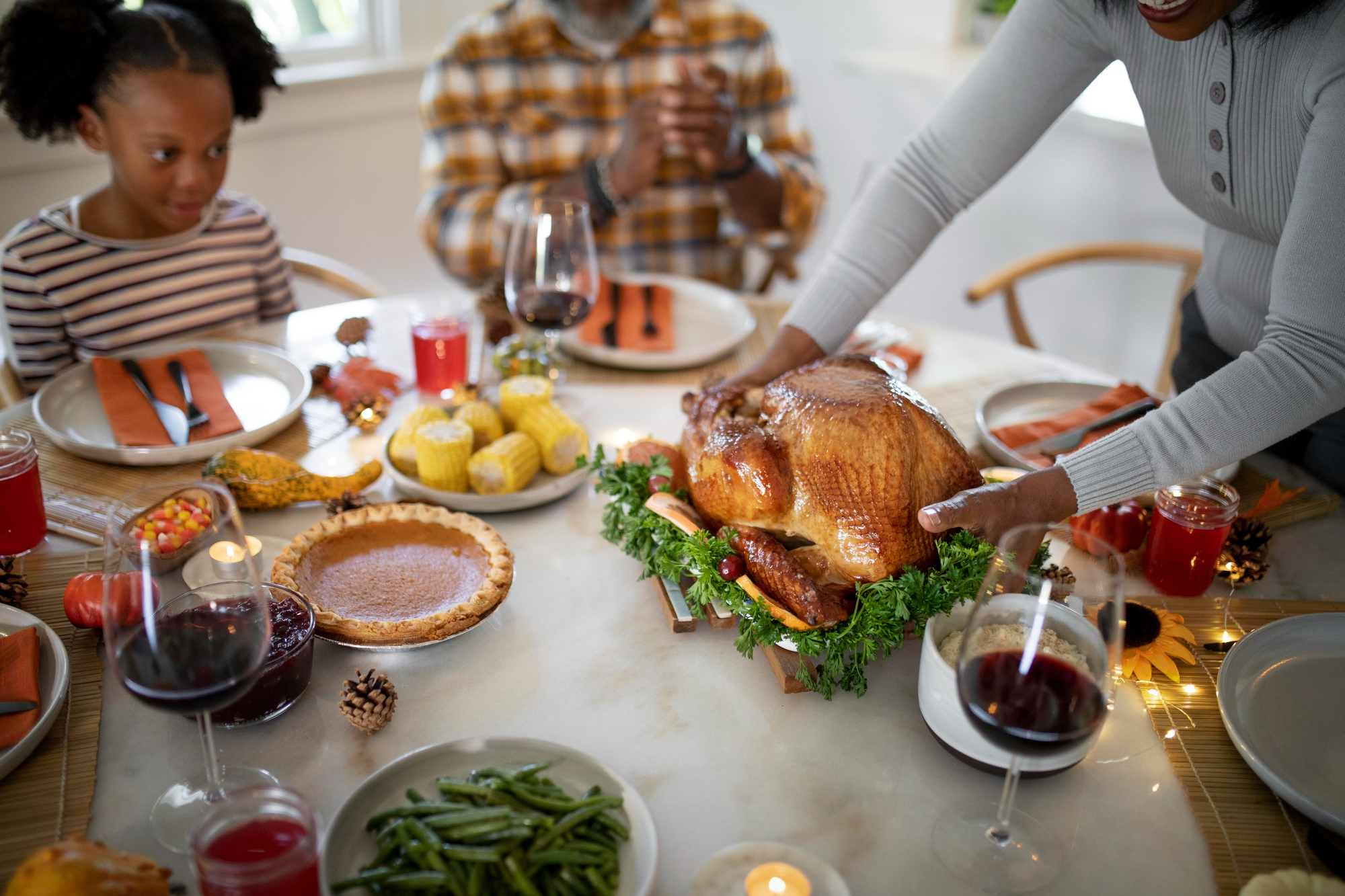 Announcing Our Copper for Kindness Initiative - family enjoying a donated thanskgiving turkey